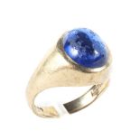 A vintage 9ct gold and oval cabochon synthetic blue spinel single stone ring.