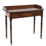 A 19th century mahogany desk with gallery rail.