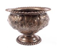 A silver footed bowl.