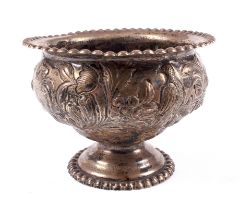 A silver footed bowl.