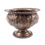 A silver footed bowl.