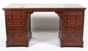 A large mahogany twin pedestal desk.