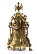 A French gilt-metal striking mantel clock, late 19th/early 20th century.