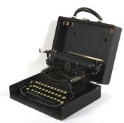 An early 20th century LC Smith & Corona portable typewriter.