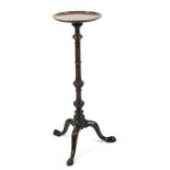 A 19th century mahogany torchere stand.