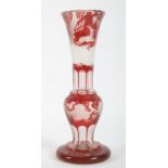 A 19th century cut glass cranberry vase.