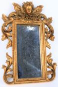 A small Victorian style gilt mirror frame.