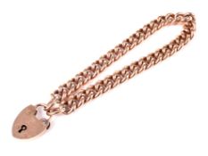 A late Victorian 9ct rose gold curb link bracelet. Each link stamped '9' & '.