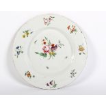A Bristol (Champions) porcelain plate painted with flowers, circa 1775.