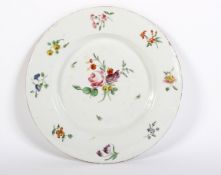 A Bristol (Champions) porcelain plate painted with flowers, circa 1775.