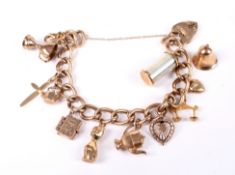 A 9ct gold curb link charm bracelet on a trigger clasp. Each link stamped '9 .