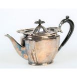 An Edwardian silver teapot.