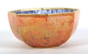 A Wedgwood orange lustre Celestial Dragons pattern octagonal bowl.