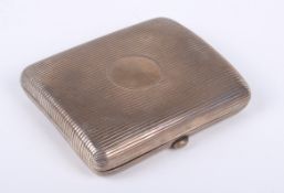 An Edwardian silver cigarette case.