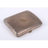 An Edwardian silver cigarette case.