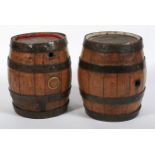 Two 19th century coopered oak barrels.