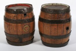 Two 19th century coopered oak barrels.