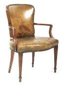 An early 20th century leather upholstered arm chair.