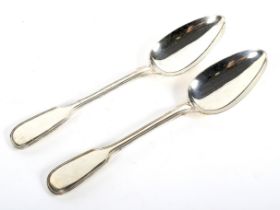 Two Victorian silver serving spoons.