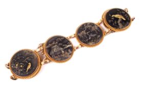 A late Victorian gold and Japanese shakudo panel bracelet. The six round shakudo panels approx.