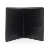 A Mont blanc black leather credit card holder.