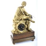 A late 19th/early 20th century French gilt-metal mounted striking mantel clock.