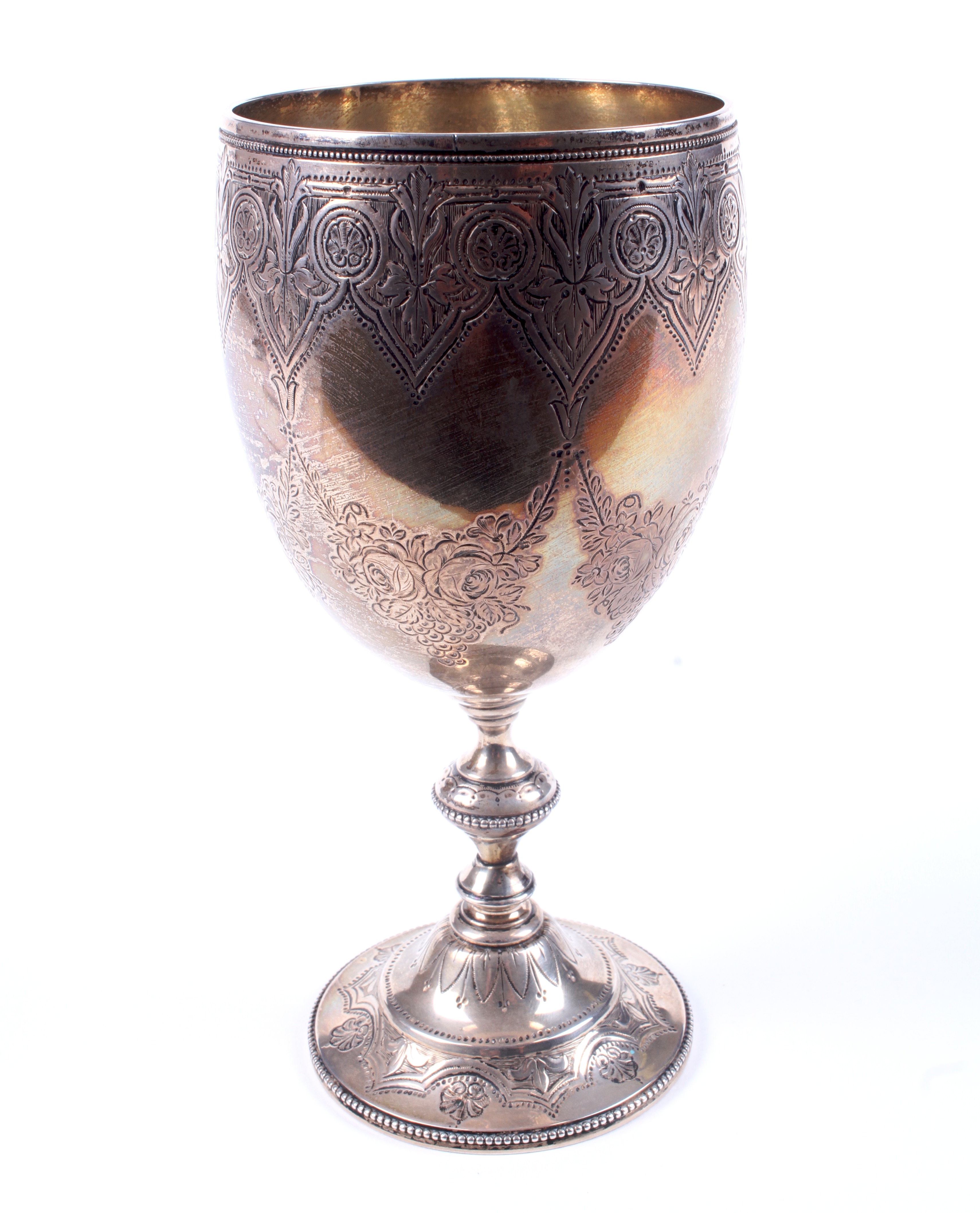 A Victorian silver engraved goblet.