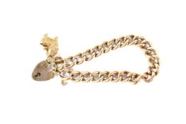 A 9ct gold heart locket charm bracelet. With one hanging charm in the form of a childs cot, 24.
