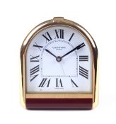 A contemporary Cartier Swiss made travel alarm clock.