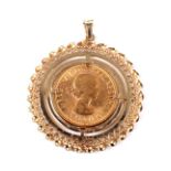 A sovereign, 1968, loosely mounted in a 9ct gold decoratively pierced round pendant mount.