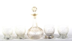 Four cut glass baluster tumblers and a Victorian shaft and globe engraved decanter and stopper.