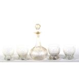 Four cut glass baluster tumblers and a Victorian shaft and globe engraved decanter and stopper.