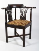 A Georgian mahogany corner chair.