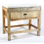 A 19th century marble mounted pine butchers block.