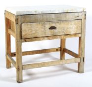 A 19th century marble mounted pine butchers block.