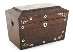 A mid-19th century rosewood and mother-of pearl-inlaid tea caddy.