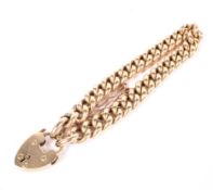 An early 20th century rose gold hollow curb link bracelet.