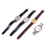 A collection of four gents wrist watches.