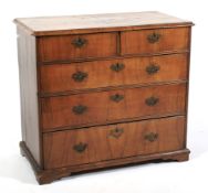 A 19th century burr walnut chest of drawers.