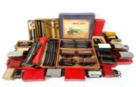 A comprehensive Hornby tin plate O gauge train set.