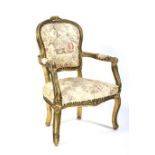 A giltwood Louis XV style armchair, late 19th/early 20th century.