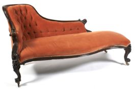 A Victorian mahogany framed button back chaise longue.