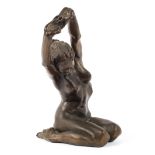 A fine bronzed resin figure of a naked lady in outstretched pose,
