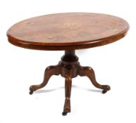 A Victorian inlaid walnut loo table.