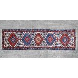 A small Tabriz runner.