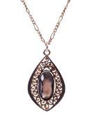 A 9ct gold and smokey quartz drop-shaped pendant and necklace.