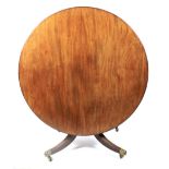 A large Victorian mahogany tilt top dining table.