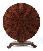 A William IV flame mahogany breakfast table.