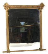 A Victorian giltwood Gothic style rectangular wall mirror.