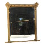 A Victorian giltwood Gothic style rectangular wall mirror.